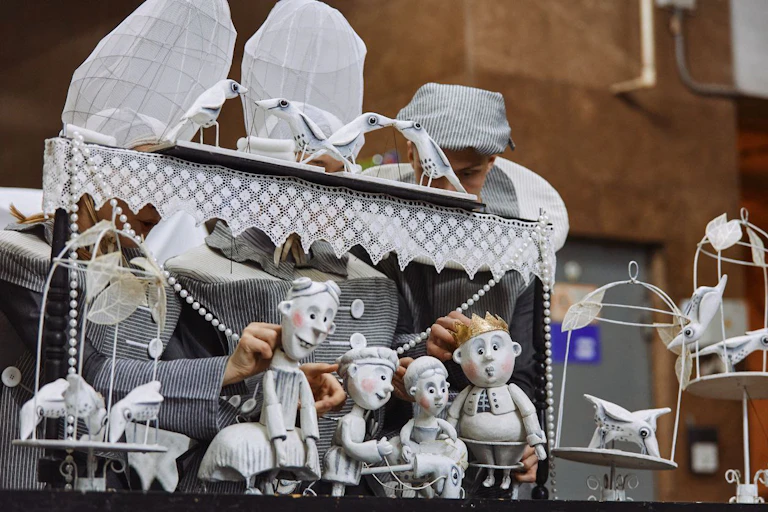 A puppet theatre and stage set up in an underground metro.