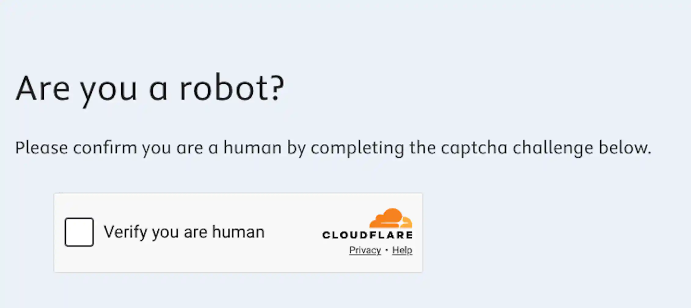 A small tick box next to the words 'Verify you are human'.