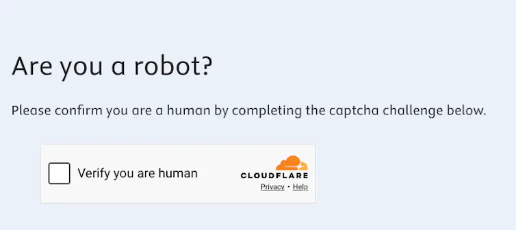 A small tick box next to the words 'Verify you are human'.