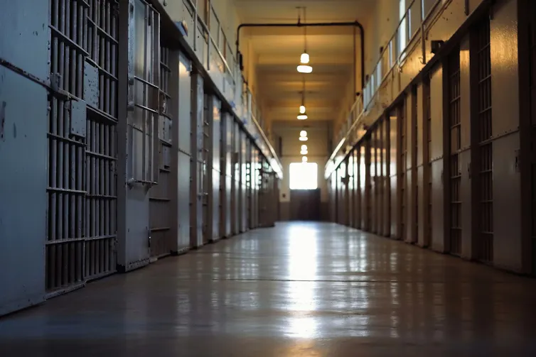 View into a prison with lots of cells
