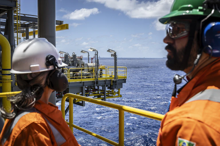 Workers on the Almirante Tamandare floating oil production, storage and offloading unit off the coast of Brazil.