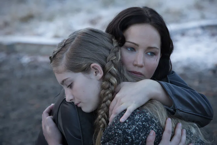 two sisters hugging