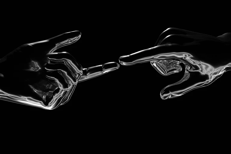 Two metallic hands touching index fingers, based on da Vinci's creation of Adam.