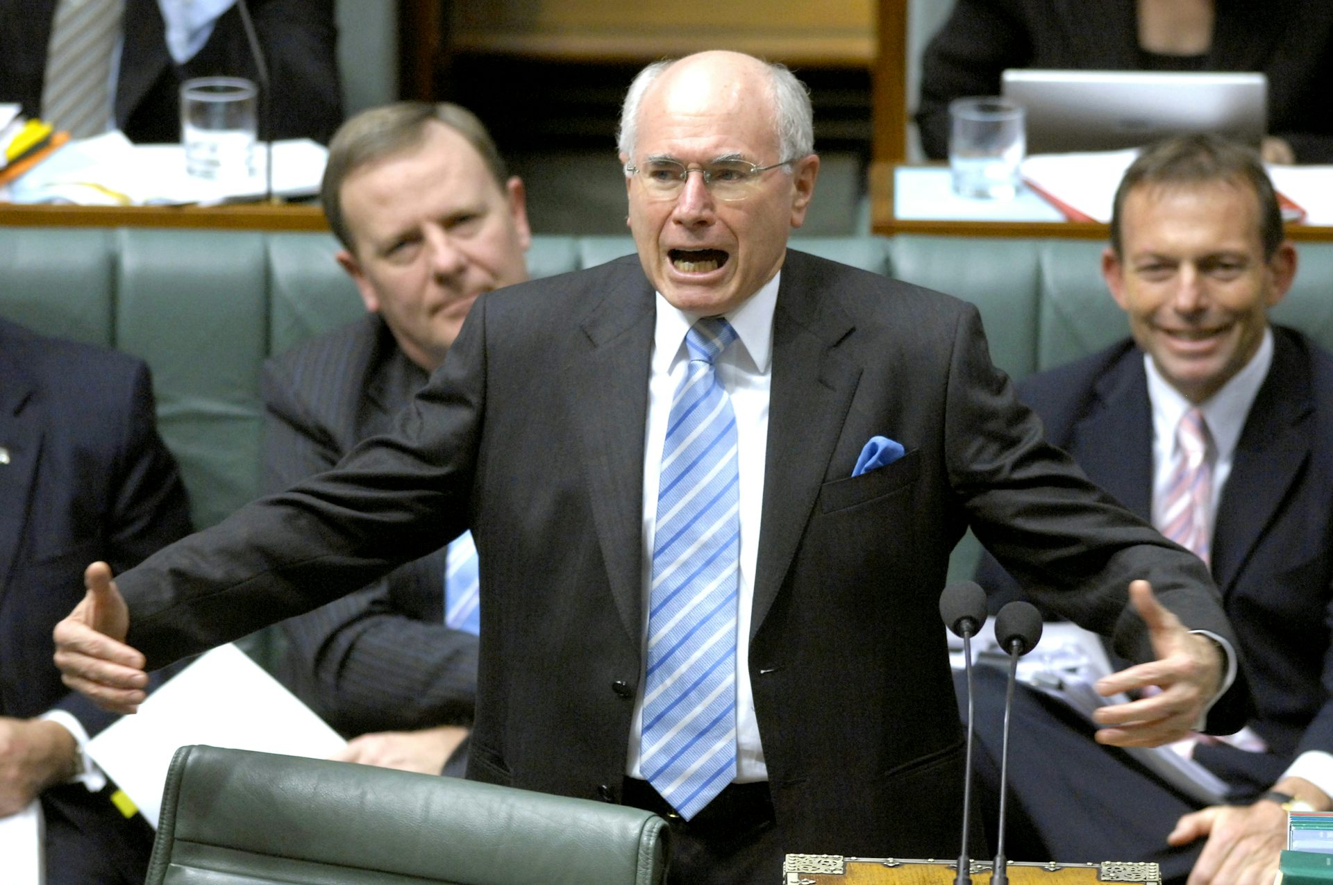John Howard speaks in parliament.