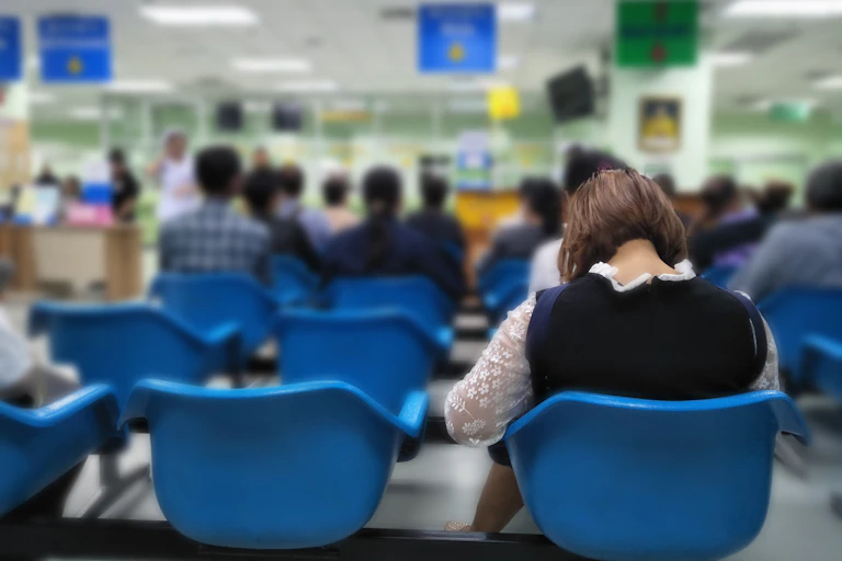 People in a hospital waiting room.