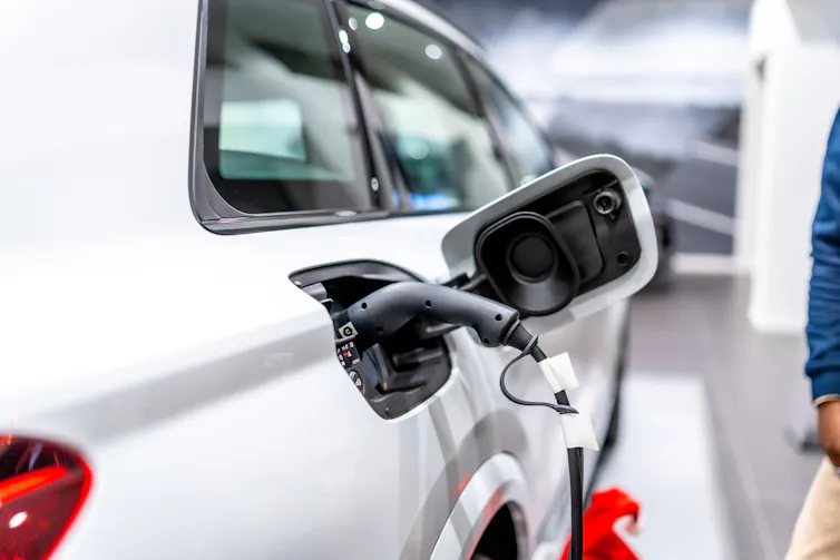 Electric car being charged