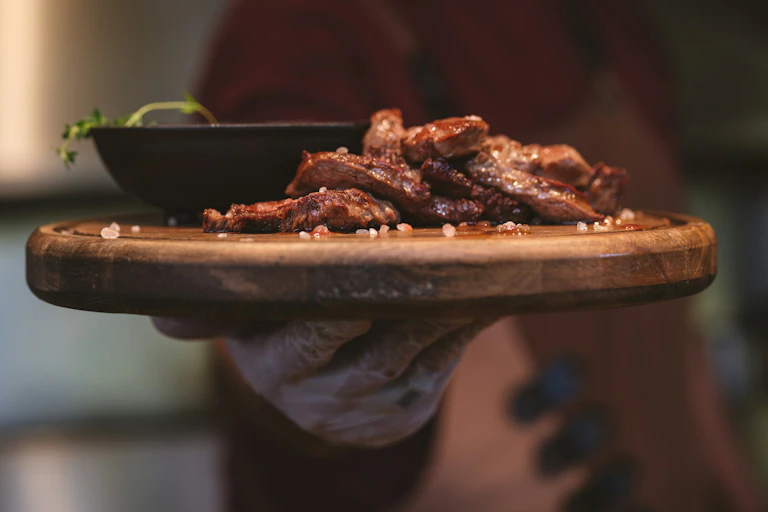 Steak on a wooden platter