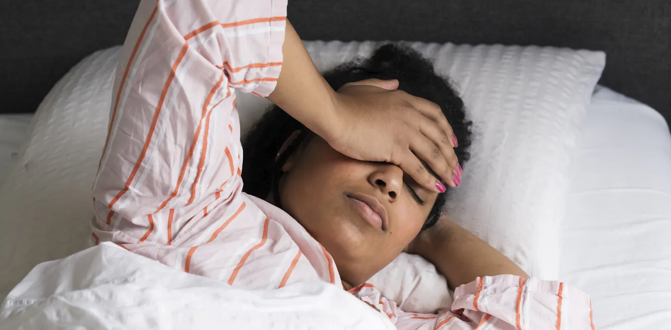 Why do I wake up so tired after vivid dreams?