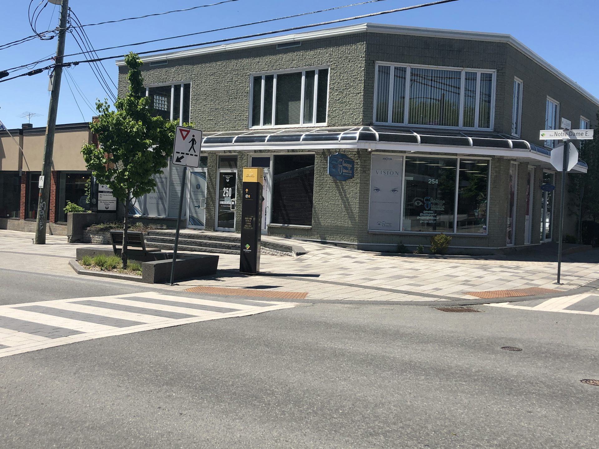 Sidewalk extension and clearly marked crosswalks