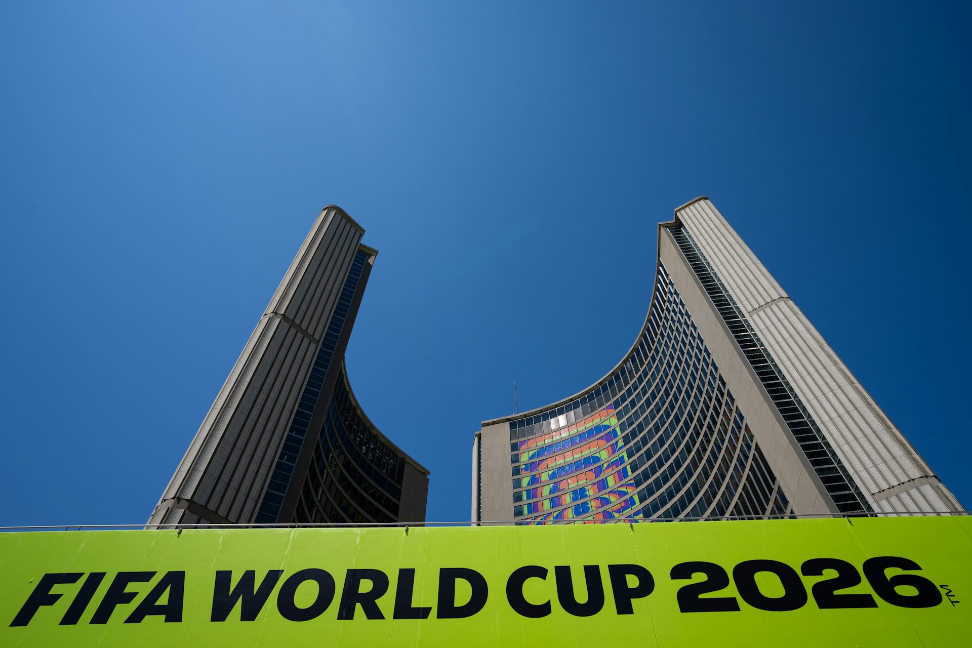 A sign that says FIFA World Cup 2026 is seen in front of a skyscraper