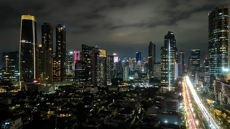 Why the sector’s maximum formidable coal phase-out deal has failed – and what it approach for local weather finance 1 Jakarta skyline at night