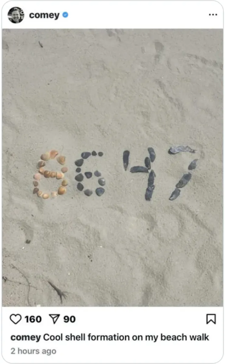 Seashells are arranged on a beach in the form of the numerals '86' and '47.'