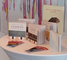 A display of picture books on a table.