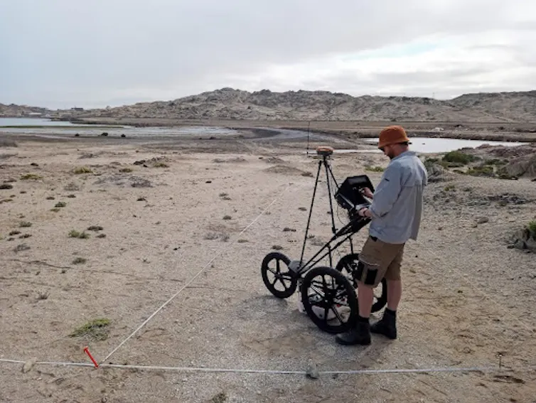 A man taking a GPR survey