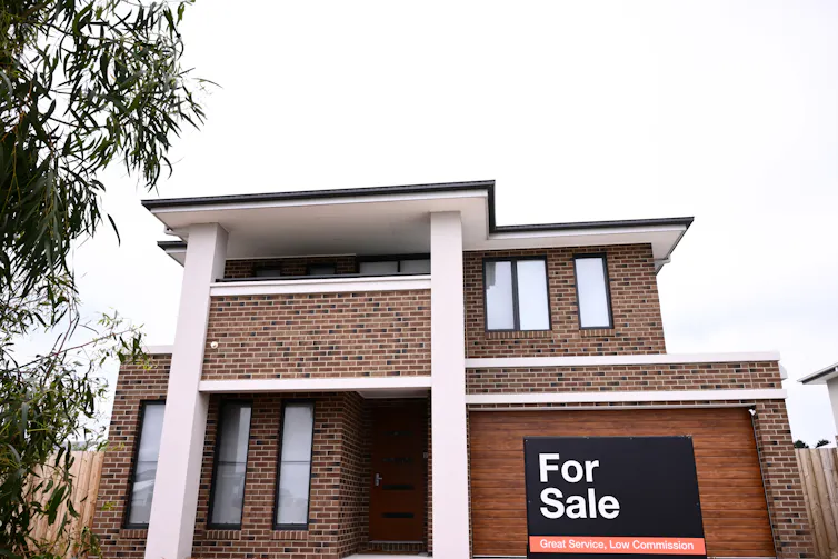 New houses and land for sale at a housing development.