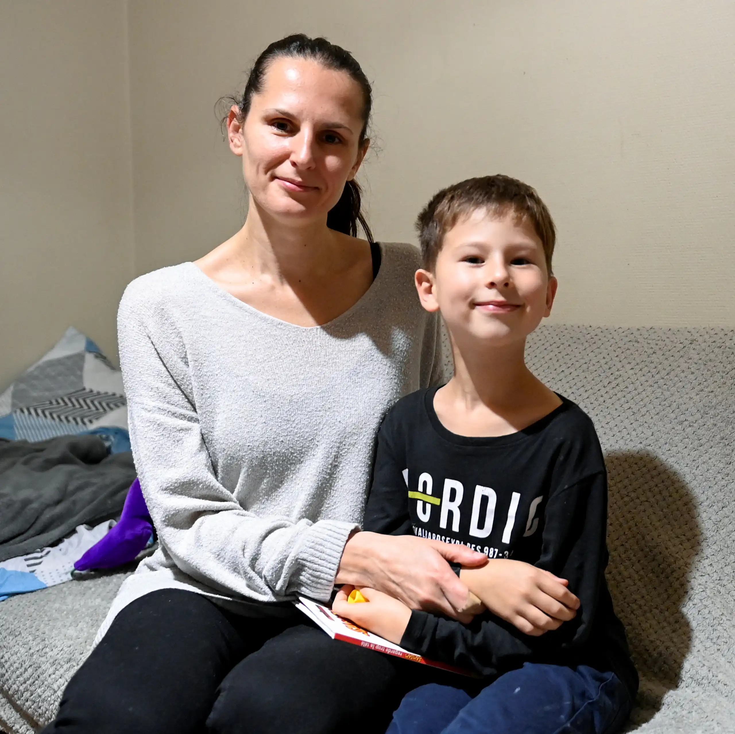 Portrait d'une femme et de son jeune fils.