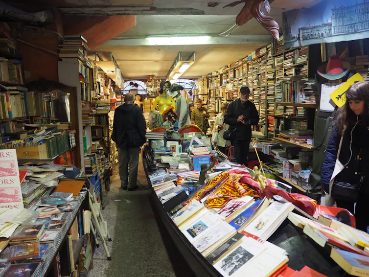 a bookshop with people in it