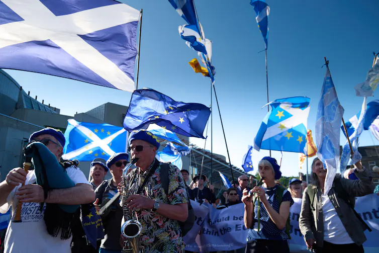 Scottish independence supporters carrying flags in Edinburgh