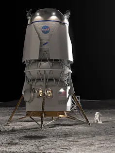 Un cohete Blue Origin explotó en la plataforma de lanzamiento, poniendo en duda el futuro del programa Artemis de la NASA 1 Ilustración de un módulo de aterrizaje cilíndrico alto con cuatro patas de metal que lo sujetan a la superficie de la Luna.