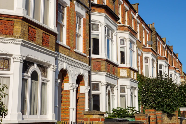 A row of Victorian terraced houses.