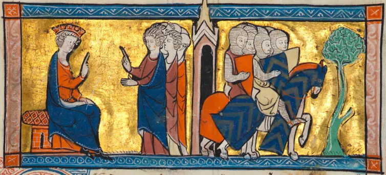 Un rey medieval consulta con los templarios.