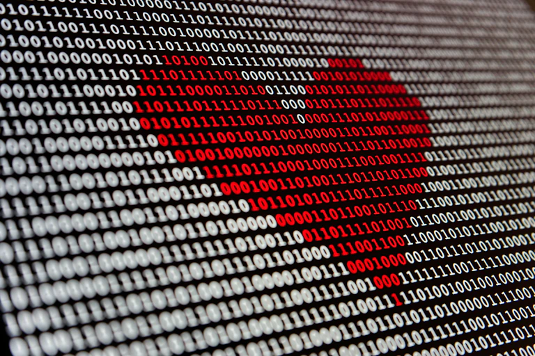 a love heart coloured over algorithms