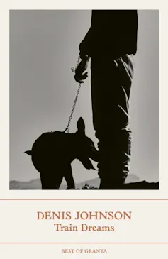 The cover for Train Dreams, showing a man holding the leash of a dog