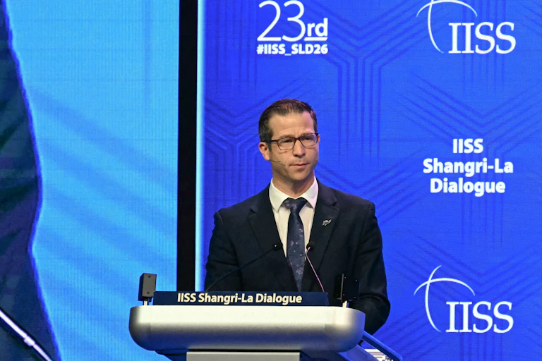 Chris Penk speaking at a lecture at the defence summit in Singapore