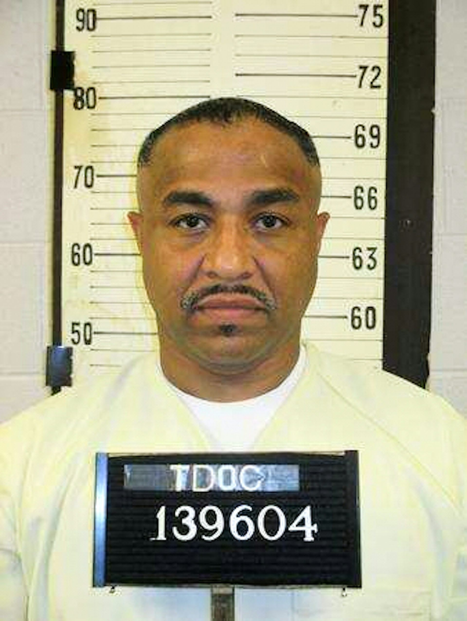 A mug shot of a Black man.