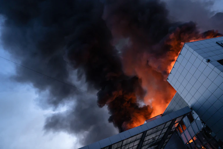 An office building in Kyiv burns after a massive Russian drone and missile attack on June 2.