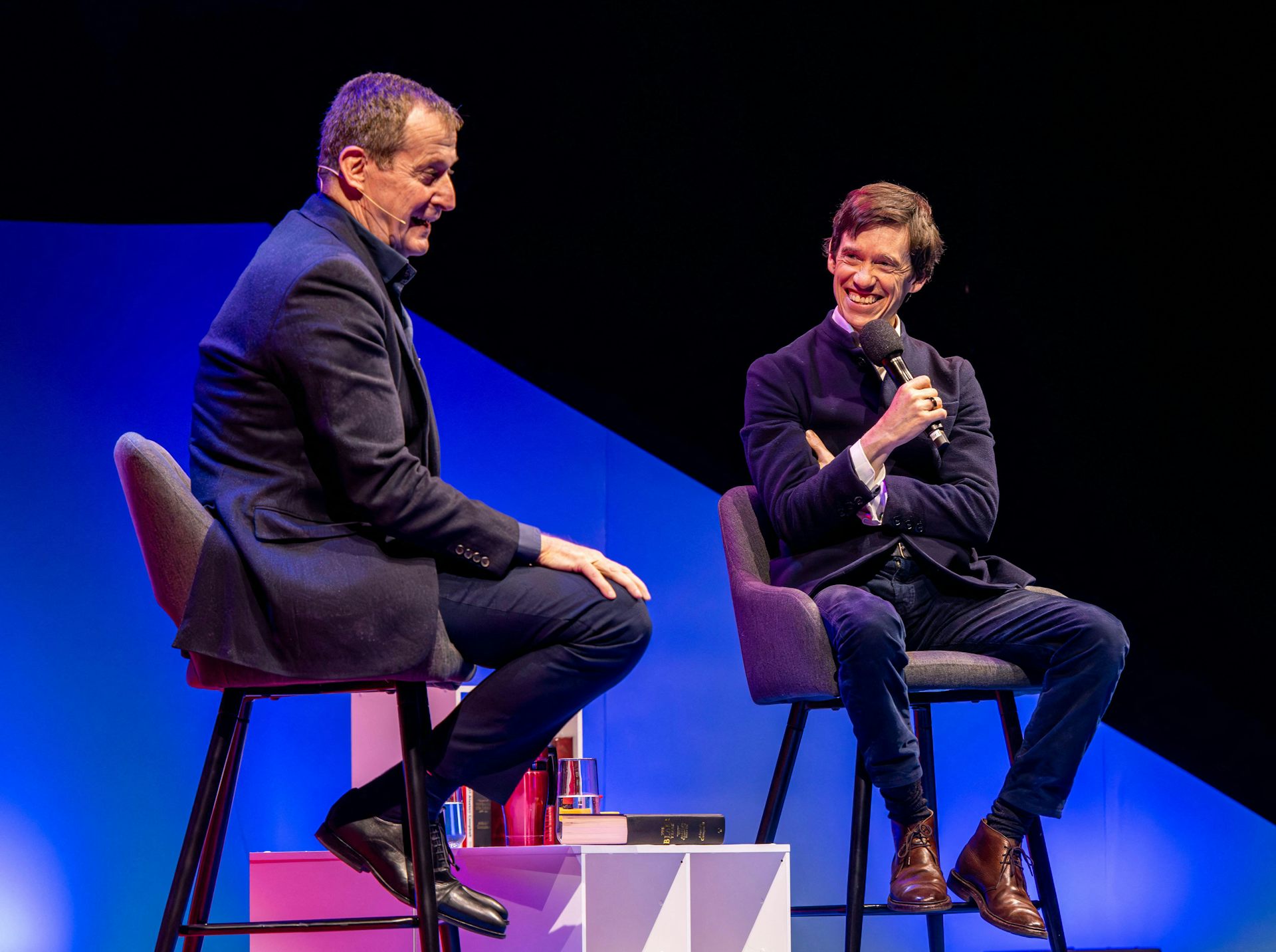 Alastair Campbell and Rory Stewart onstage at a live TRIP event