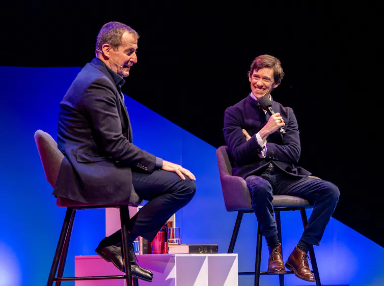 Alastair Campbell and Rory Stewart onstage at a live TRIP event