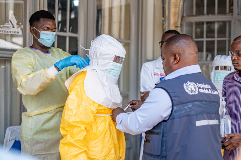 A medical worker puts on a protective suit in Goma, the Democratic Republic of the Congo (DRC), on June 4, 2026.