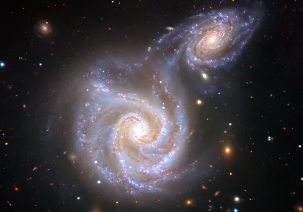 Artist's impression of the young Milky Way colliding with another galaxy around 10 billion years ago.