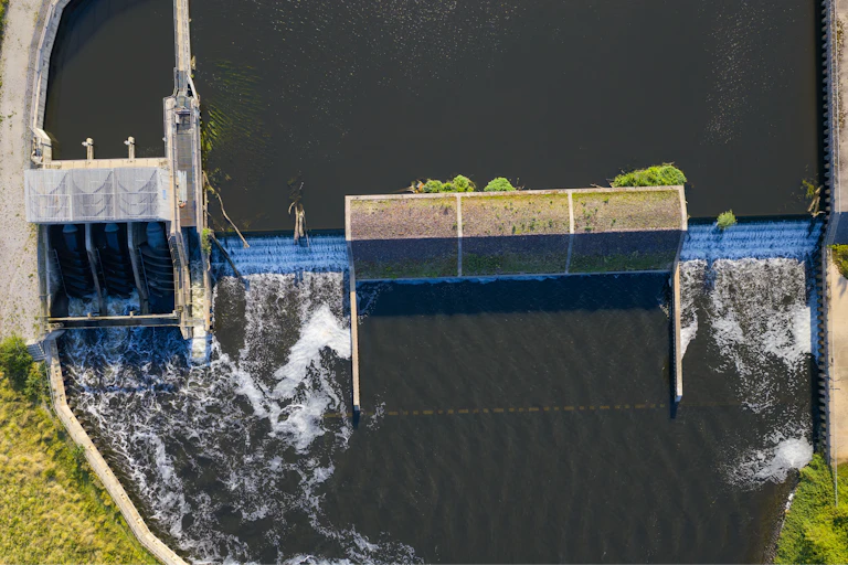 drone shot of weir in river