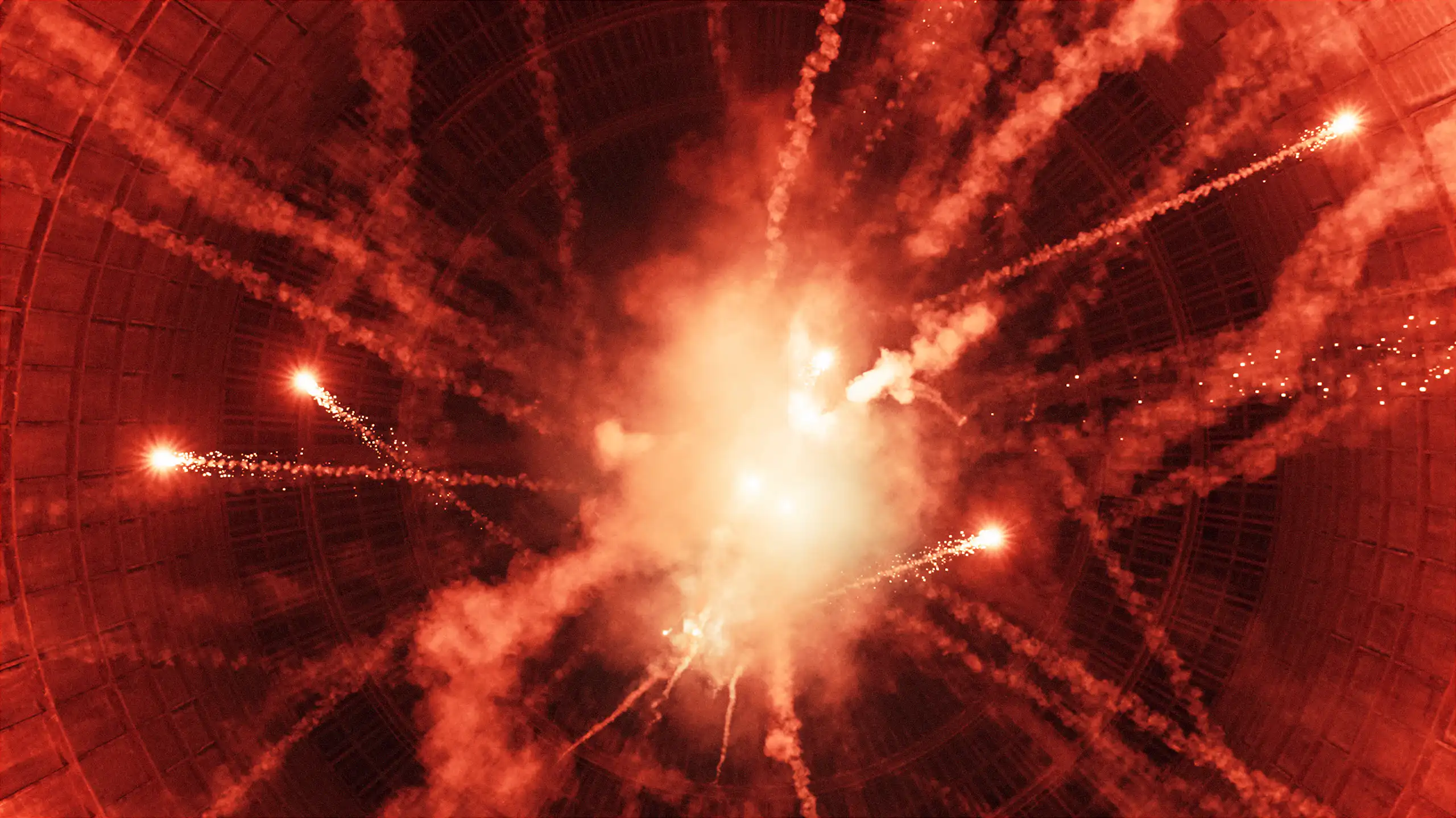 An artwork with a bright orange light and streaks of smoke and sparklers hurtling in various directions.