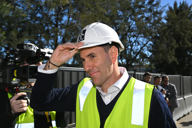 Jim Chalmers in a hardhat and vest