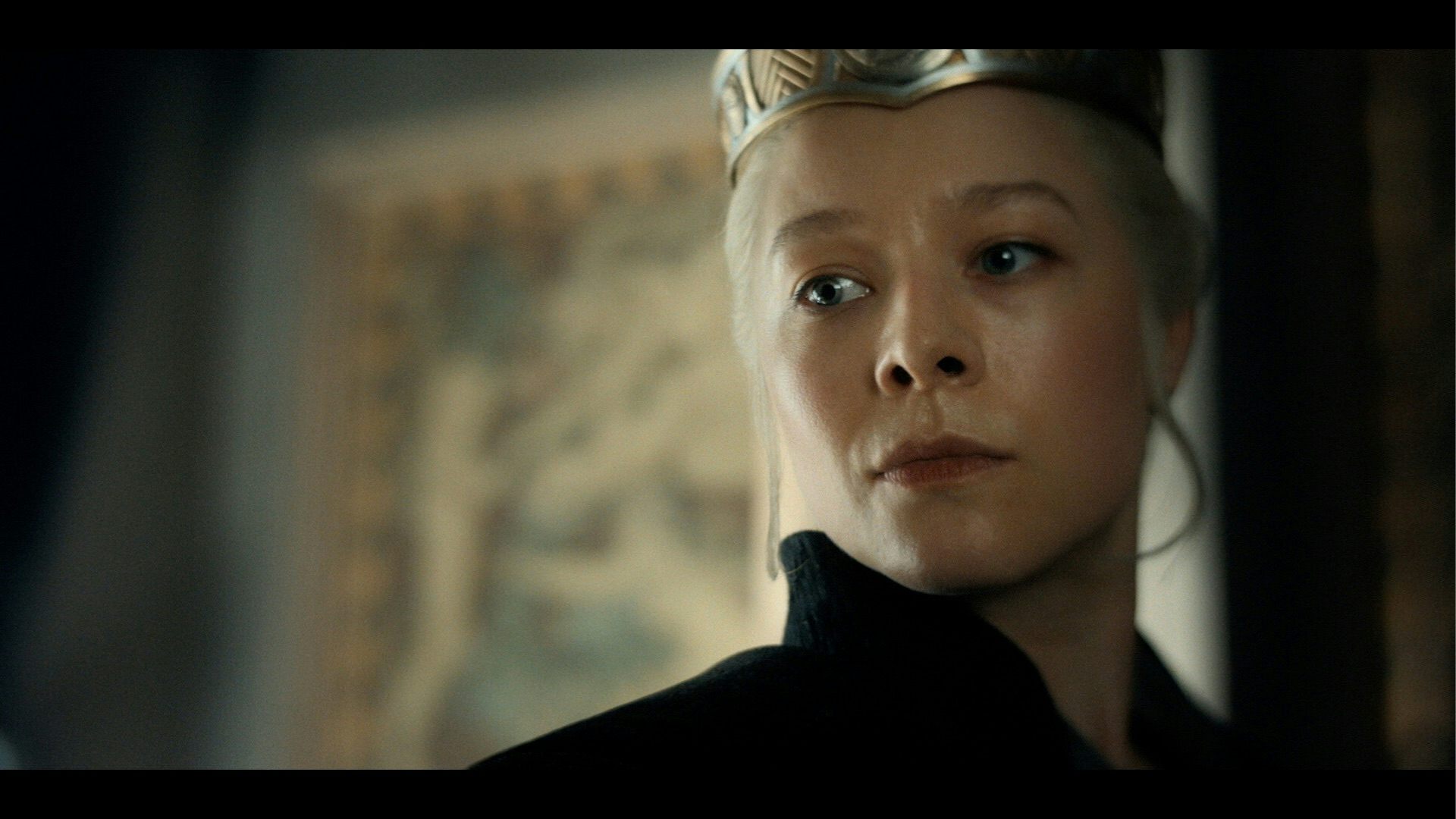 Emma d'Arcy in a crown.