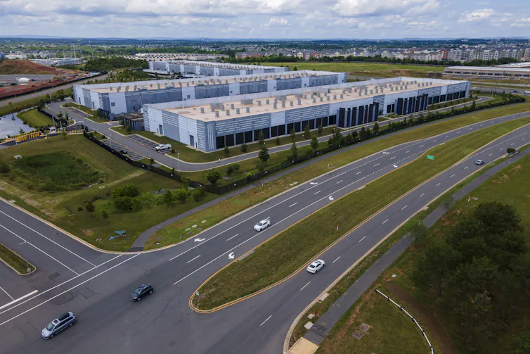 An overhead shot of a data center, which is made up of several blocklike concrete buildings