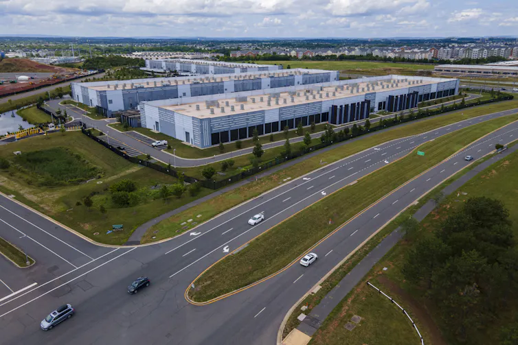 An overhead shot of a data center, which is made up of several blocklike concrete buildings