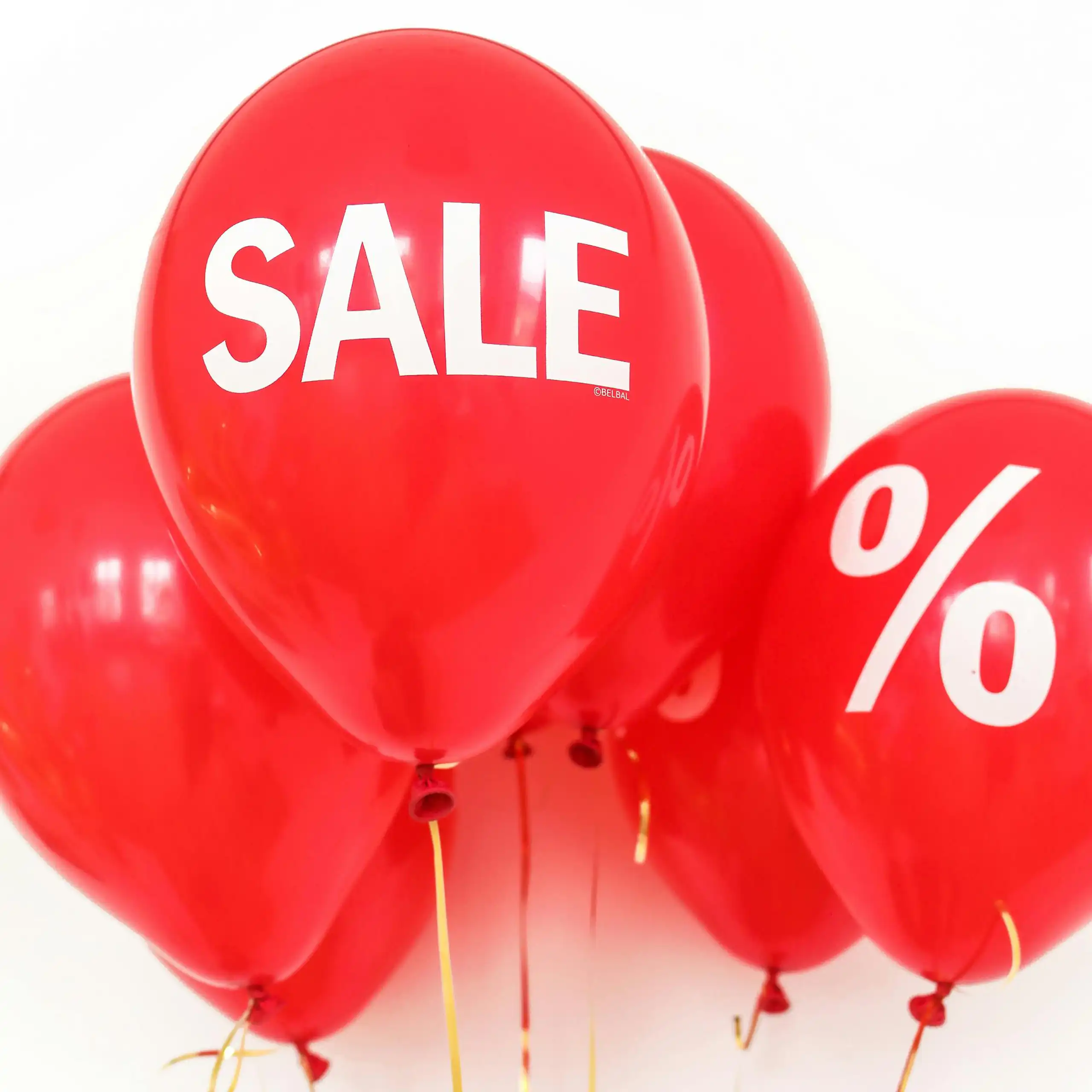 Red balloons with the word sale on one in the centre