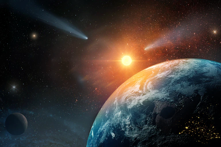 Earth from space with sun shining in background