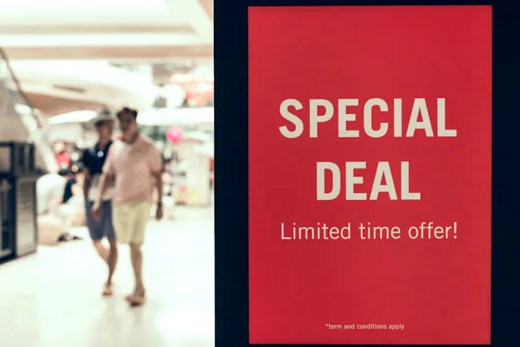 a sign in a store reading: special deal limited time offer!