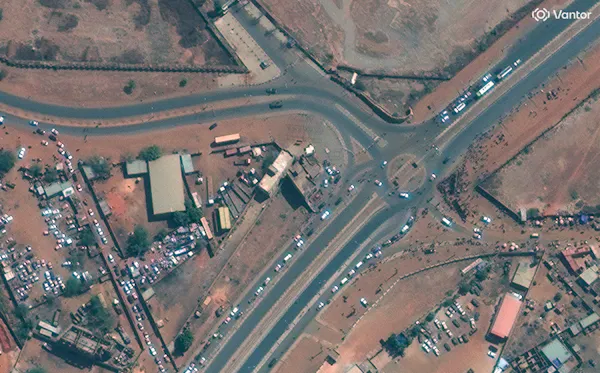 An aerial photo shows roads leading into an airport.