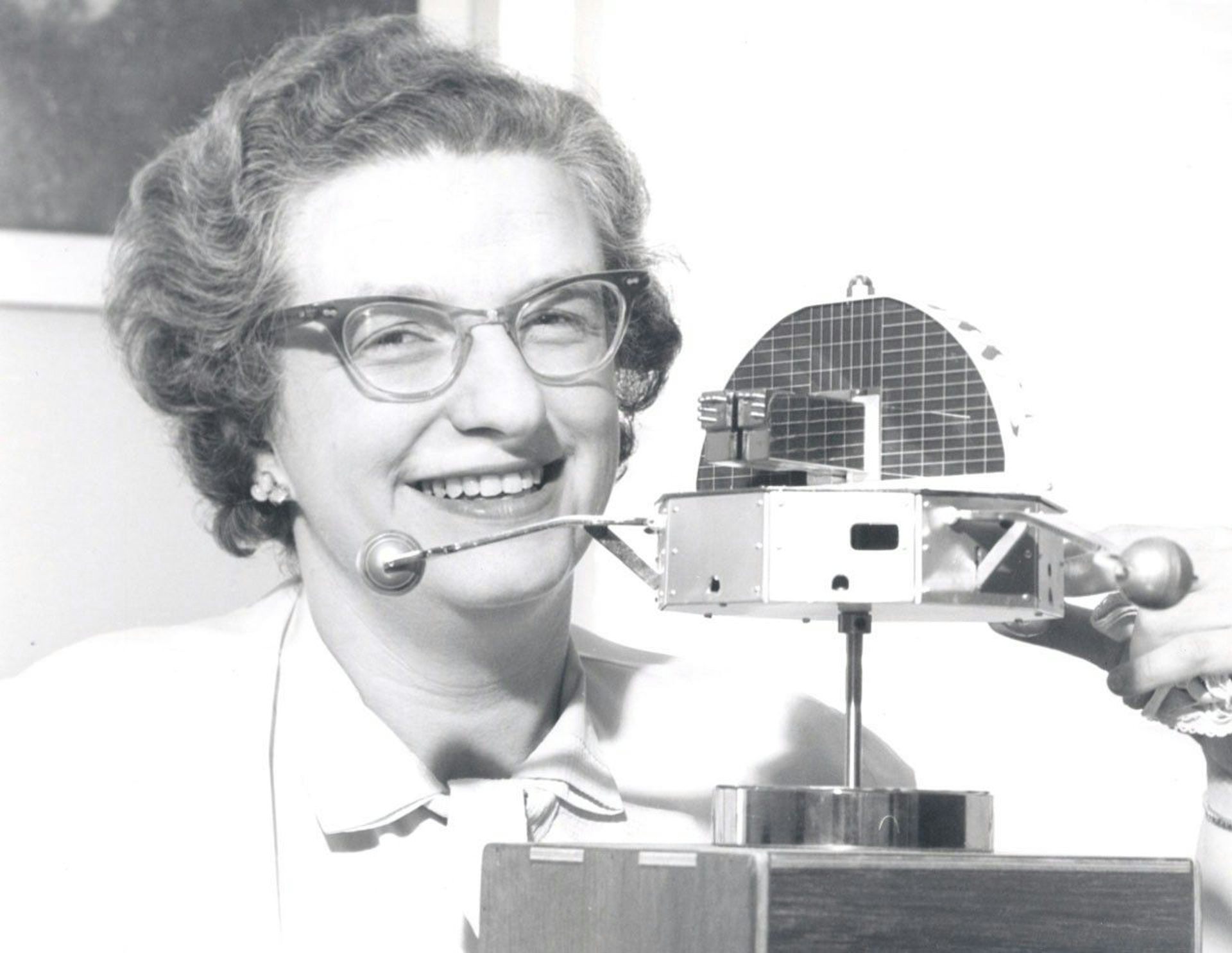 Nancy Roman with a model of the Orbiting Solar Observatory (OSO) astronomy satellite in 1962.
