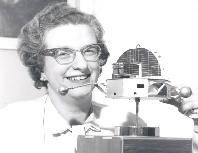 Nancy Roman with a model of the Orbiting Solar Observatory (OSO) astronomy satellite in 1962.