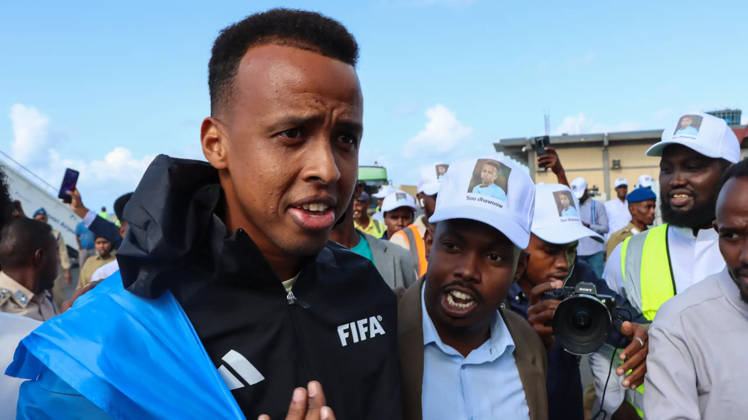 Referee Omar Artan is greeted by supporters in Mogadishu, Somalia.