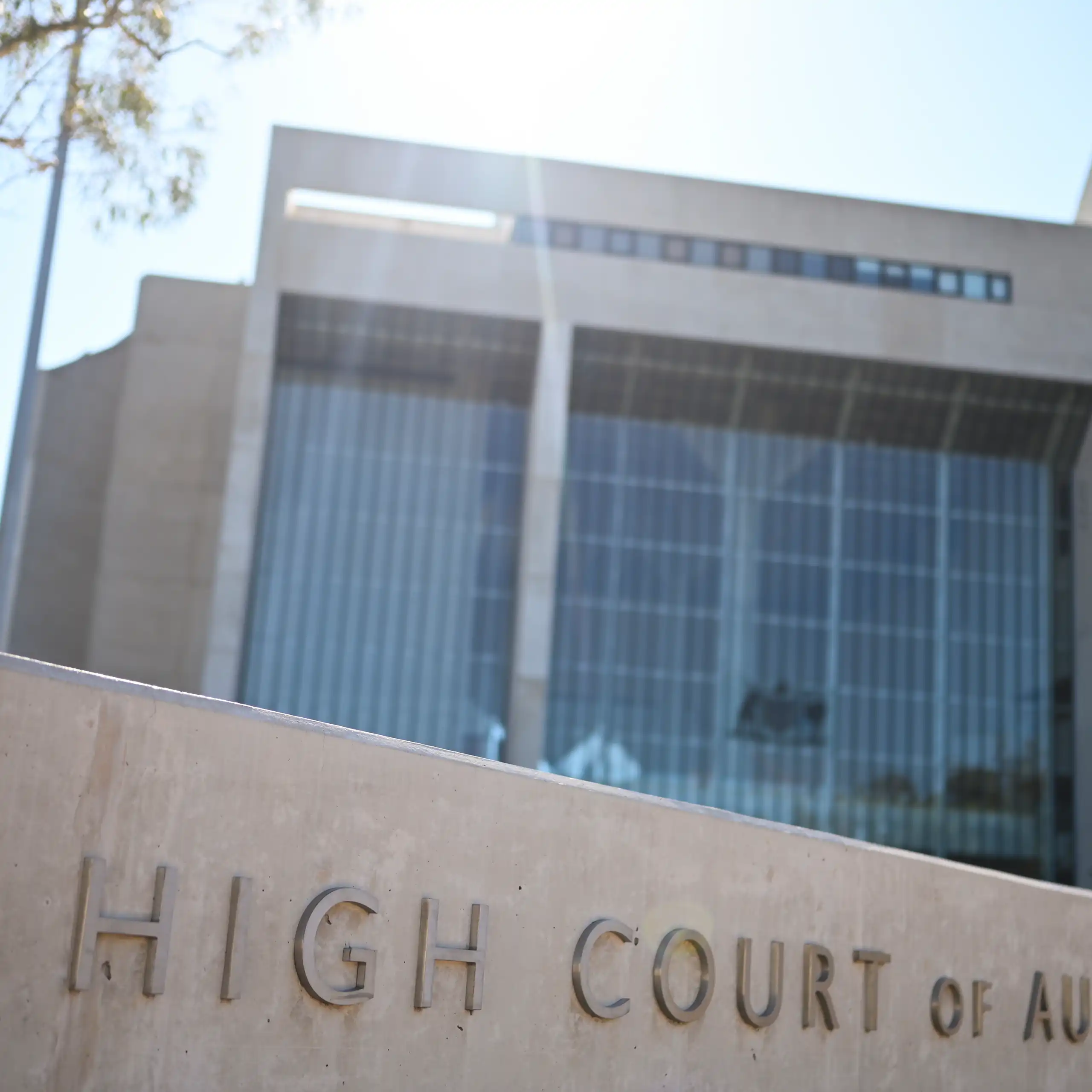 A concretes sign and building saying High Court of Australia