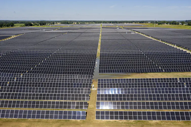 A wide view of a large area covered in solar panels.
