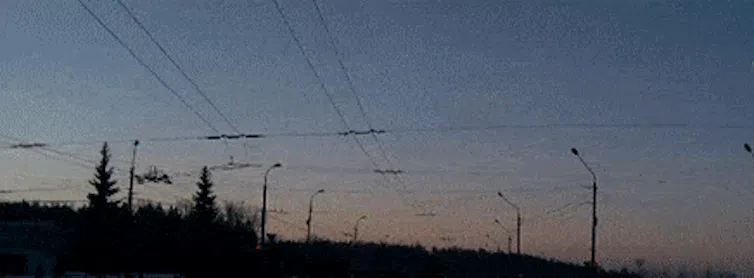 A gif of a bright streak moving across the sky and growing brighter towards the end of its journey